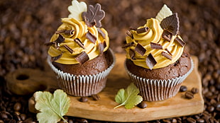 cupcake with yellow frosting, cupcakes, dessert, food