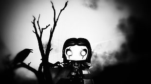 black and white cartoon character vinyl figure, The Crow, toys, monochrome