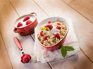 strawberry rice and yogurt on bowl
