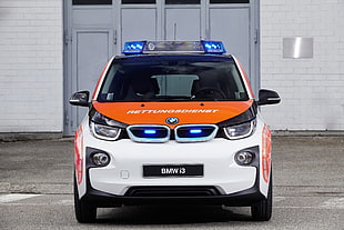 photograph of white and orange BMW i3 HD wallpaper