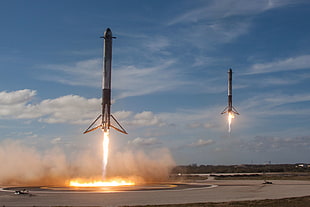 two gray rockets, SpaceX, rocket, smoke, Cape Canaveral