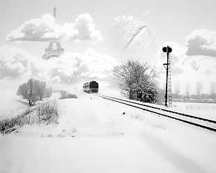train and railroad at snowy background near Eiffel tower