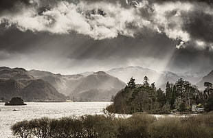 landscape photography of mountains beside body of water near forest, derwentwater