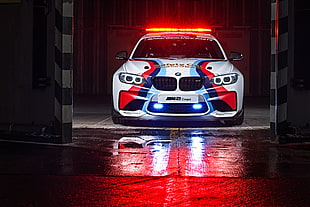 white, red, blue, and teal BMW car in garage HD wallpaper
