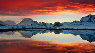 snowy mountain with orange clouds horizon photo HD wallpaper