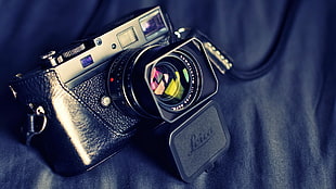 photography of black and silver SLR camera