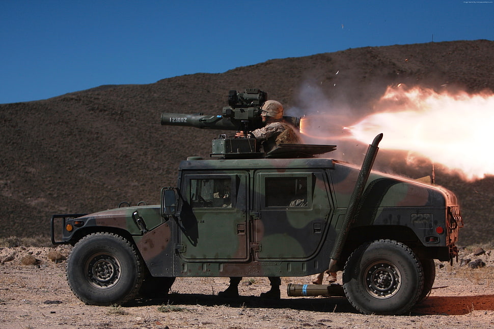 soldier on green car firing a missile HD wallpaper