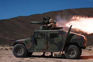 soldier on green car firing a missile