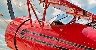 closeup photo of red monoplane HD wallpaper