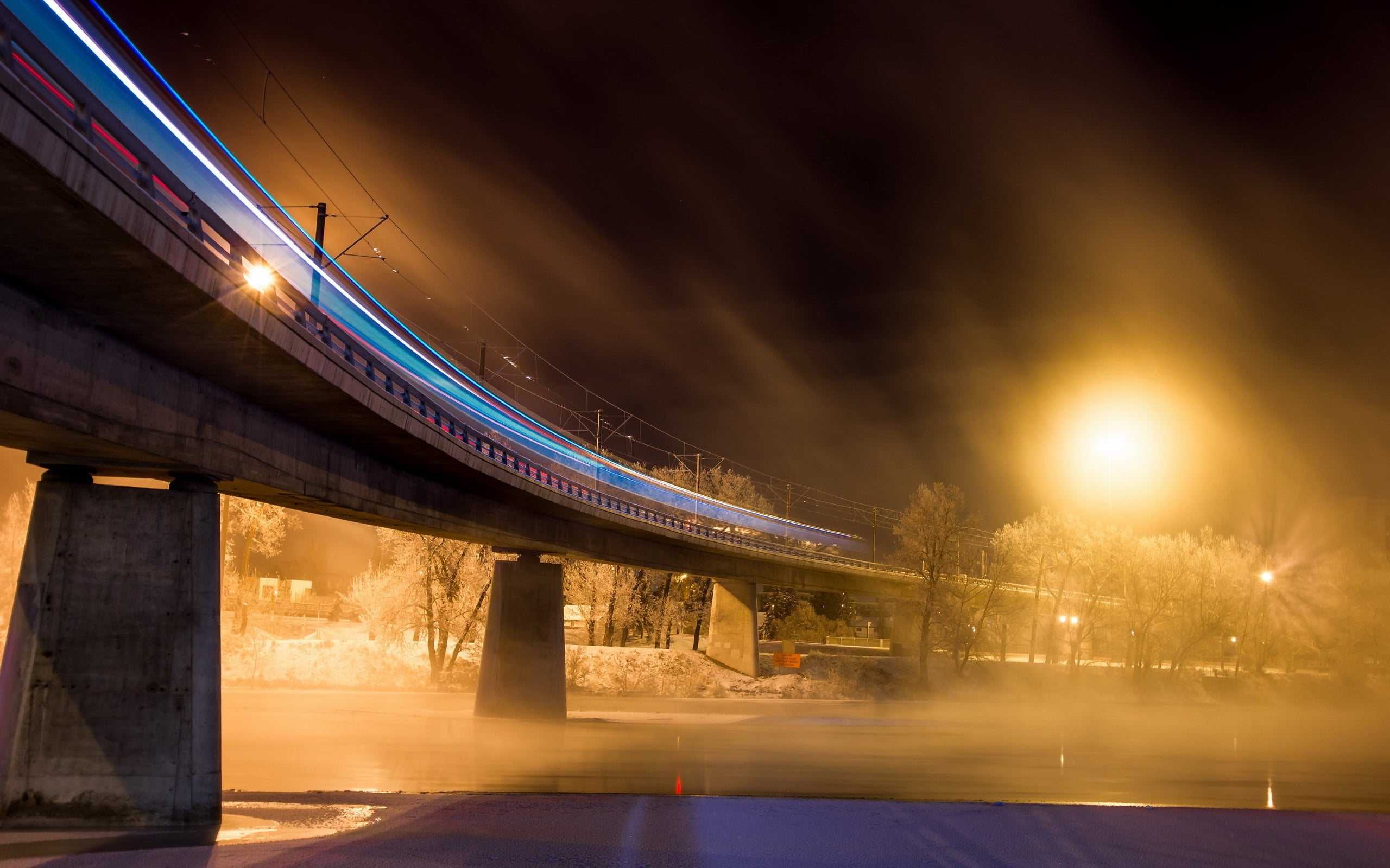 timelapse photography of train on rail