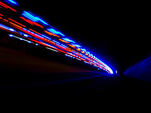 time lapse photography of lights in tunnel
