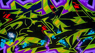 black, green, and purple graffiti