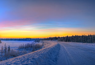 snow covered road across the horizon HD wallpaper