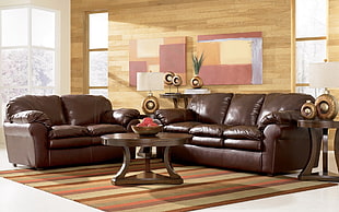brown leather 3-seated couch HD wallpaper