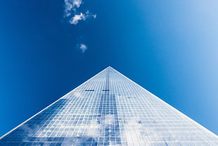 below angle photo of concrete monument, architecture, building, clear sky, symmetry