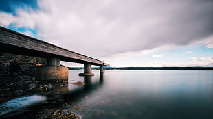 brown broken bridge beside body of water, norwegian HD wallpaper