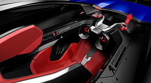 closeup photo of black and red Peugeot Sport vehicle