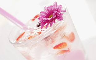 clear, pink, and orange drink
