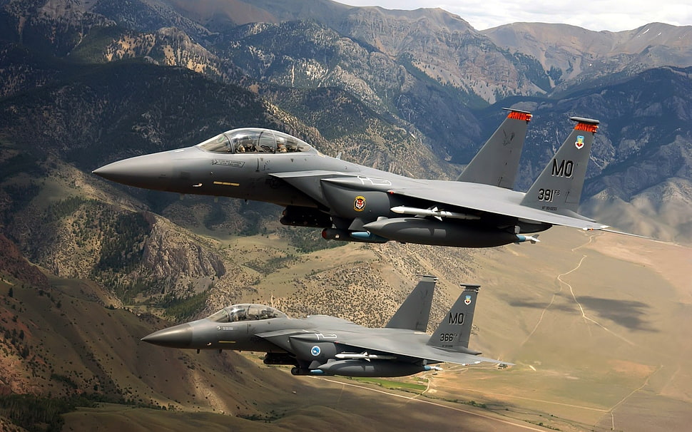 two fighter aircraft flying above The mountain HD wallpaper