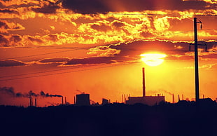 silhouette of utility post, sunset