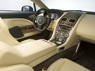 black vehicle steering wheel and car stereo