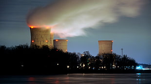 four white industrial machines, nuclear power plant, smoke, power plant, cooling towers