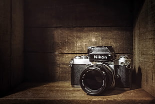 black Nikon camera HD wallpaper