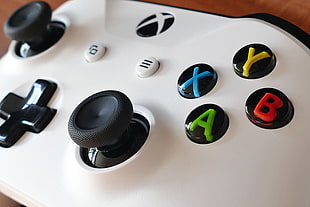 white and black Xbox One controller