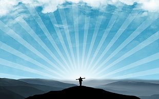 silhouette painting of person standing at peak of mountain during sunrise HD wallpaper