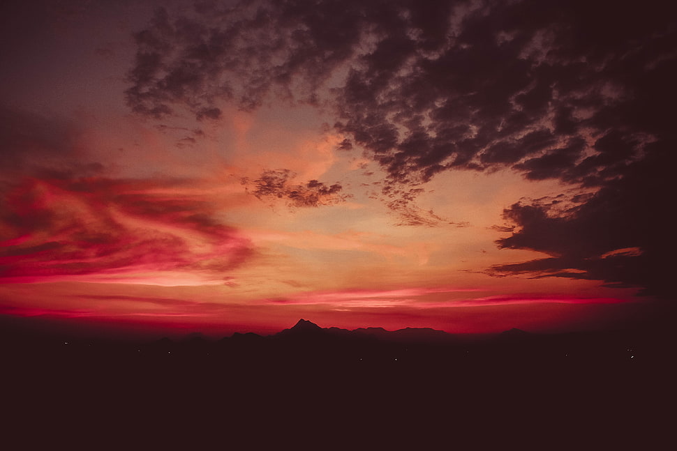 silhouette of mountain during sunset HD wallpaper