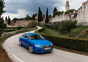 blue Audi sedan