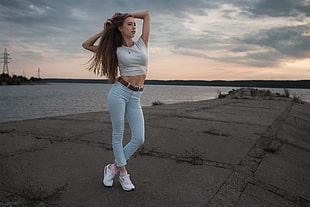 women's white cropped top and blue jeans, arms up, women, Dmitry Shulgin, women outdoors