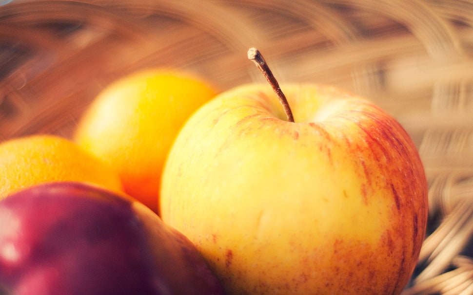 close-up photo of Apple fruit HD wallpaper