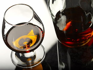 brown liquid in clear wine glass HD wallpaper