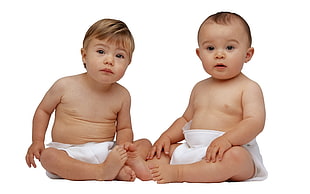 two babies with white garments
