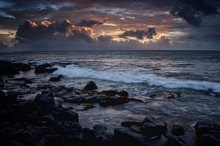 photo of rocks and sea HD wallpaper