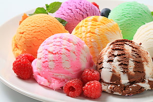 assorted-color ice creams served on plate