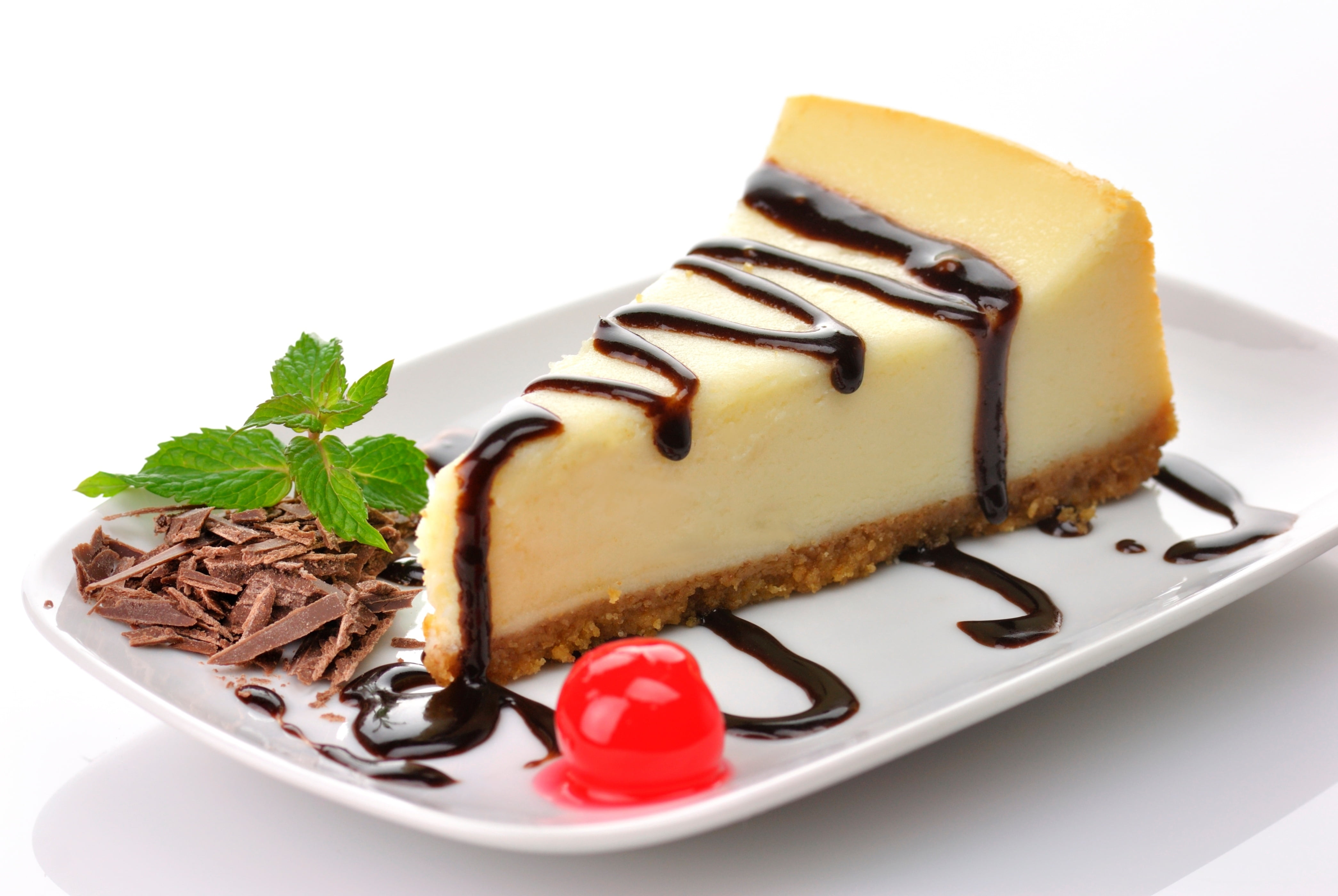 slice of cake with chocolate syrup on white ceramic plate HD wallpaper.