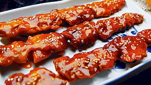 barbecue with sauce and sesame seeds
