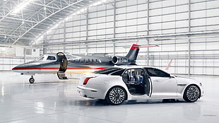 white sedan and black private jet, Jaguar XJ, car, jet fighter, aircraft