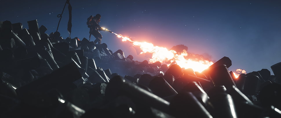 man holding flamethrower HD wallpaper