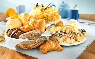 close up photography of pastries on top of table runner