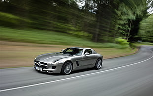 time lapse photography of silver Mercedes-Benz SLS-AMG coupe