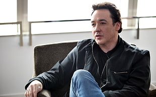 photo of man in black jacket