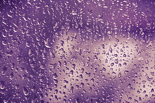 raindrops on glass panel