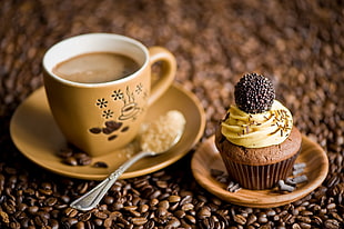 cupcake and brown ceramic coffee cup, coffee, coffee beans, photography, drink