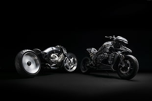 two black cruiser motorcycles