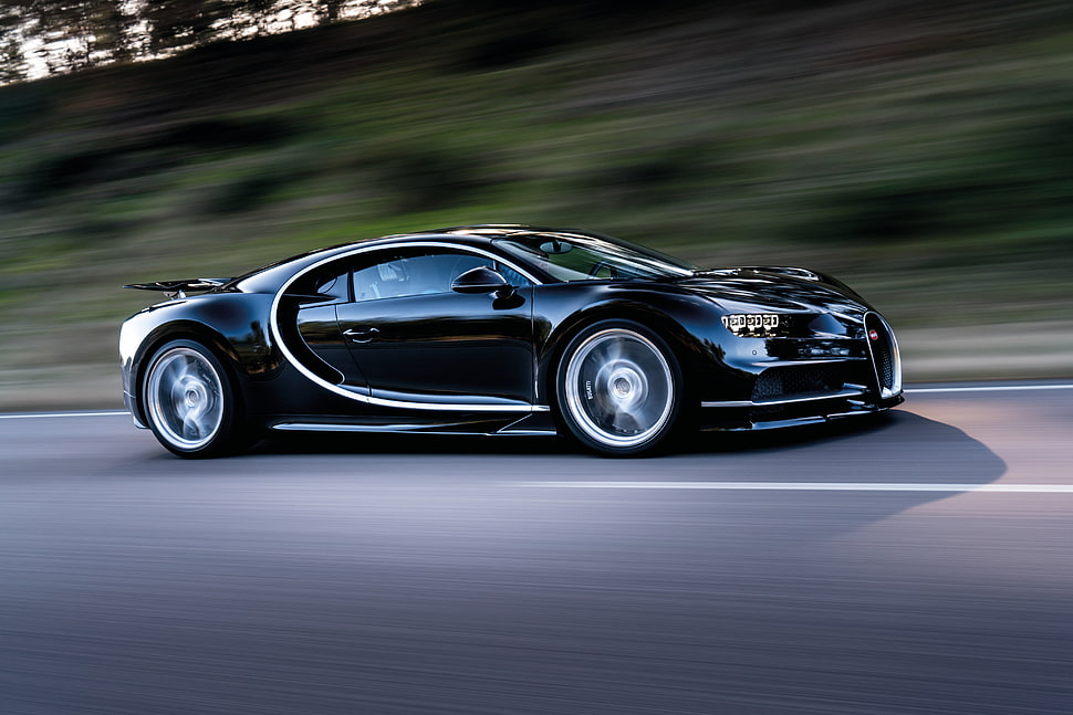 black Bugatti Chiron running on road near trees HD wallpaper