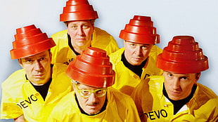 five men wearing red plastic hat