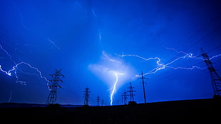 silhouette photo of electrical post with lightning, nature, landscape, lightning, storm HD wallpaper
